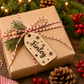 Custom wooden Christmas name tags attached to presents