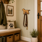Wooden dog leash holder hanging in hallway with dog lead