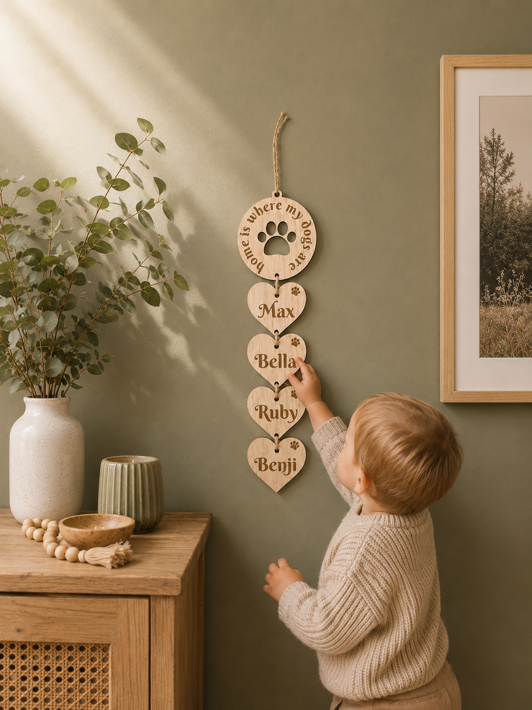 wooden wall plaque home is where my dogs are with hearts showing their names 