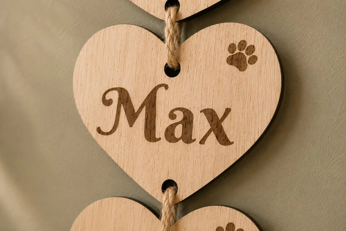 wooden wall plaque home is where my dogs are with hearts showing their names 