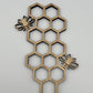 Handmade wooden plant trellis with bee design
