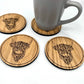 Coffee mug placed on Highland Cow wooden coaster