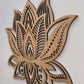 Wooden wall art with intricate laser-cut design on a plain background