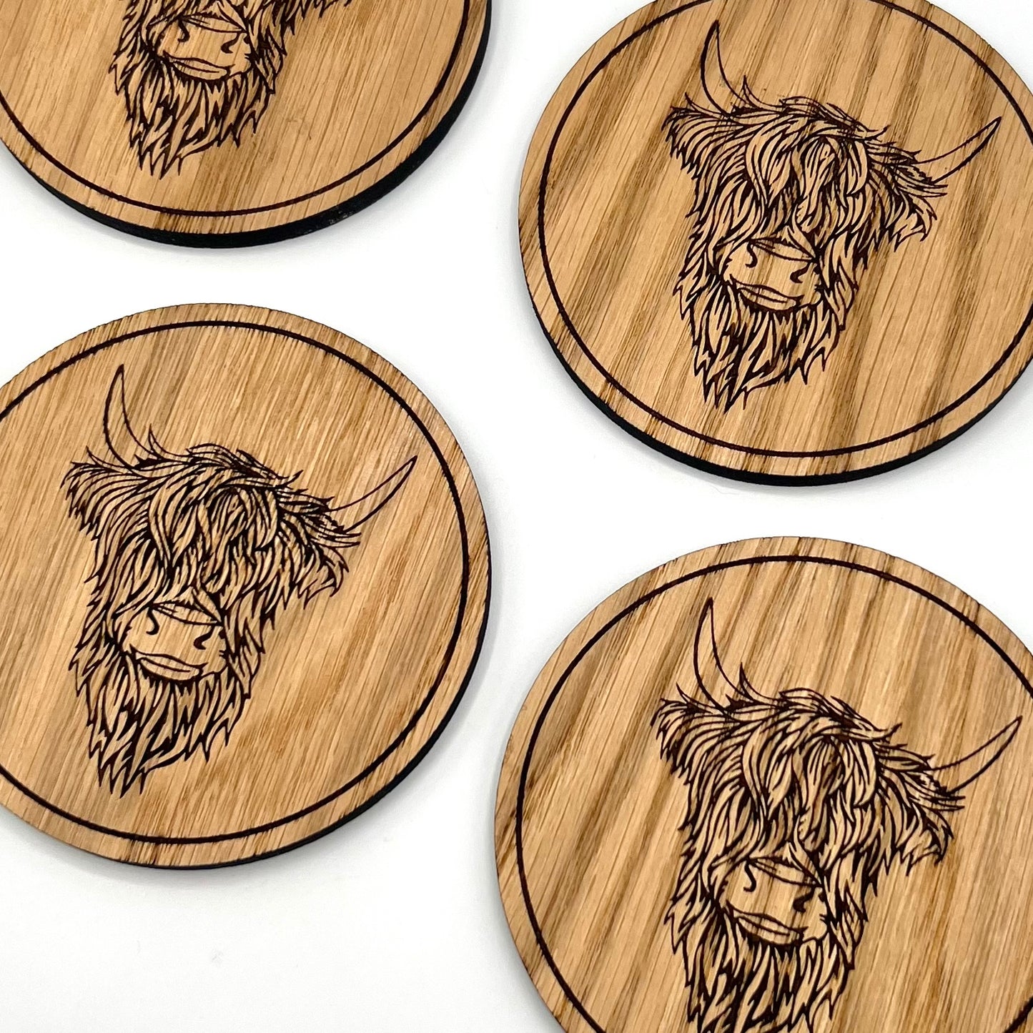Set of handmade Highland Cow wooden drink coasters