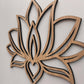 Wooden lotus flower wall art on a light gray background