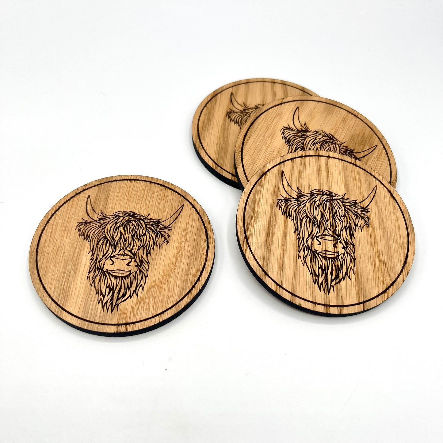 Set of handmade Highland Cow wooden drink coasters