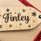 Personalised wooden Christmas gift tags with engraved names
