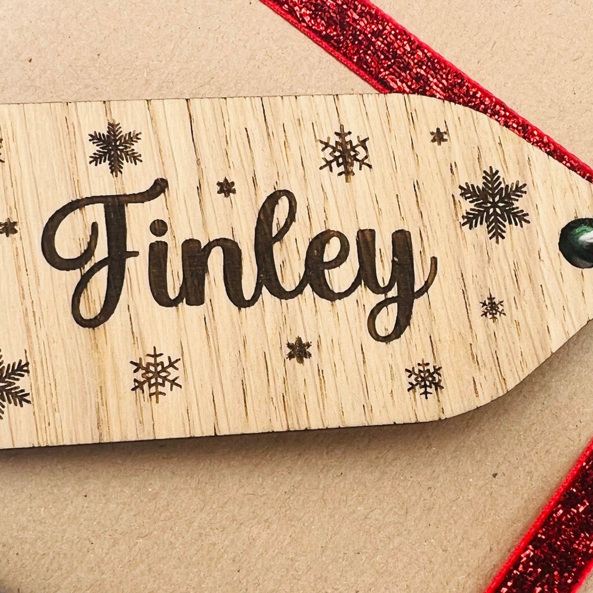 Personalised wooden Christmas gift tags with engraved names